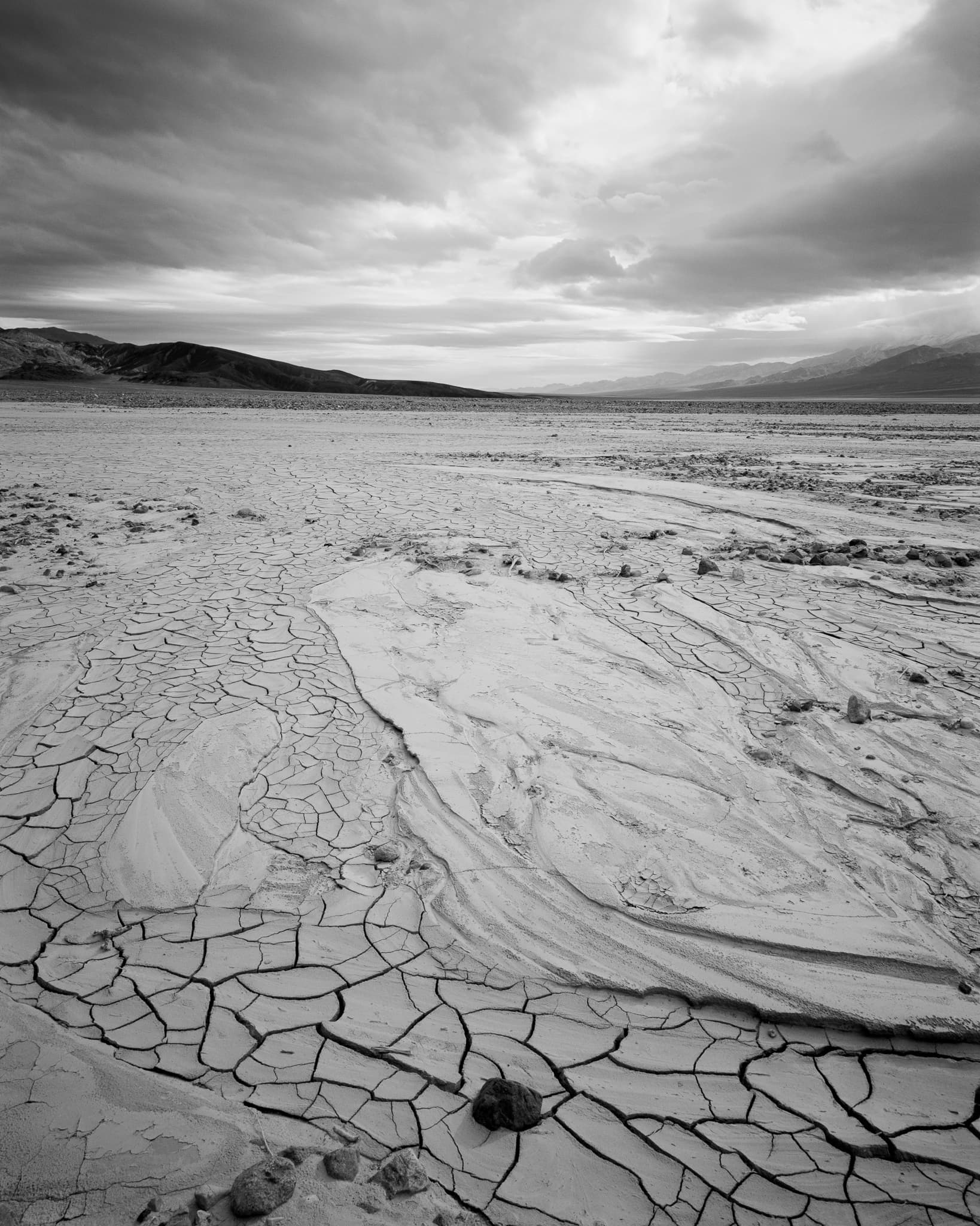 A summer storm was building over Death Valley at sunrise, California. Photograph by Marty Quinn